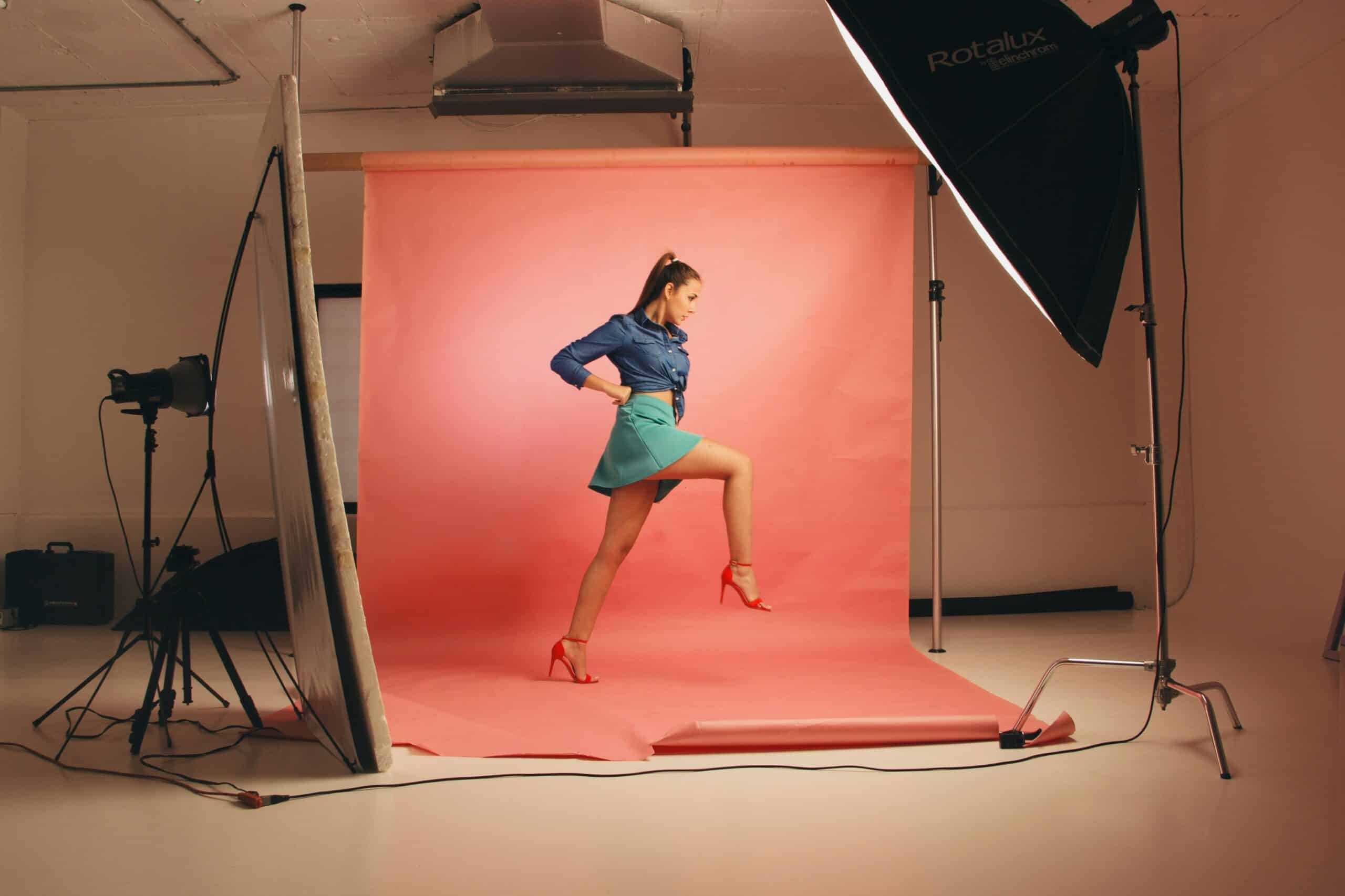 Woman posing for a professional photography shoot in a studio